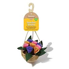 Pet chew toy made of natural ingredients. Made to look like a hanging basket of flowers.