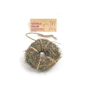 A ring of dried alfalfa with a cardboard display label.