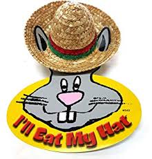 Straw sombrero attached to ears of cardboard depiction of a rabbit with the text 'I'll eat my hat'.