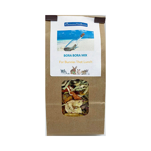 A paper bag with a plastic window showing dried fruit and veg.